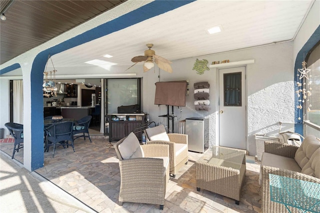 18033 Edgewater Dr, Port Charlotte, FL 33948 - view of patio featuring an outdoor hangout area and ceiling fan