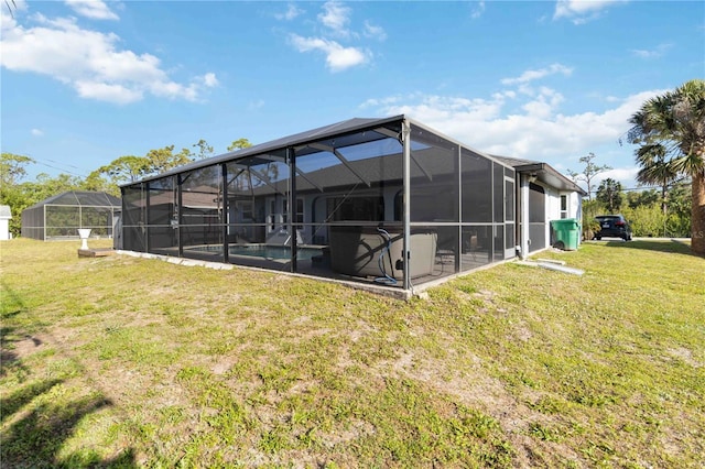 18033 Edgewater Dr, Port Charlotte, FL 33948 - back of house with a lawn, a patio, a lanai, and an outdoor pool