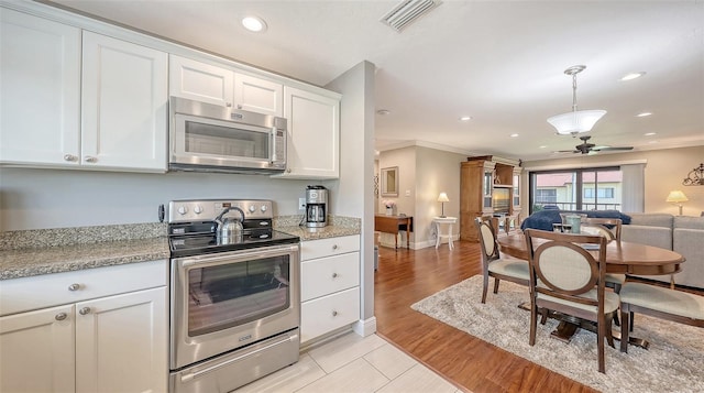 kitchen featuring ceiling fan, white cabinetry, visible vents, recessed lighting, and appliances with stainless steel finishes