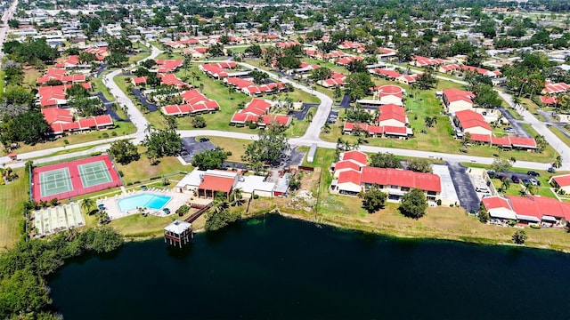 drone / aerial view with a water view