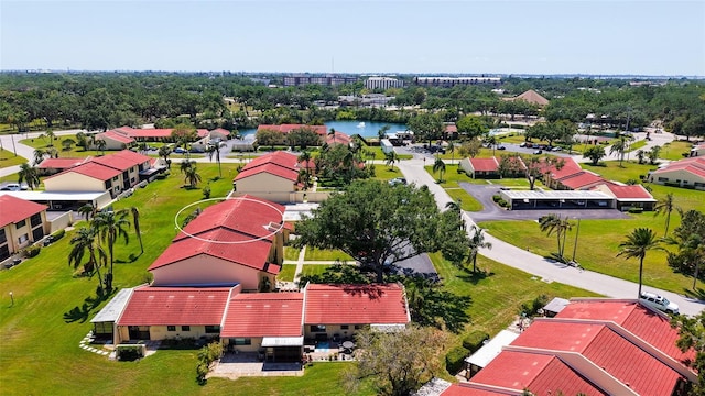 birds eye view of property with a residential view