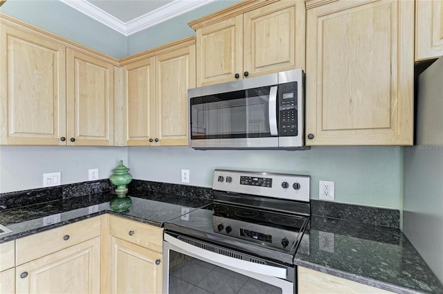 kitchen featuring appliances with stainless steel finishes and light brown cabinets