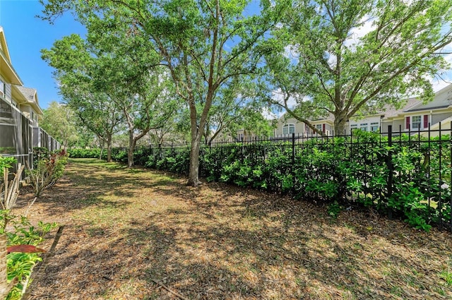 view of yard featuring fence