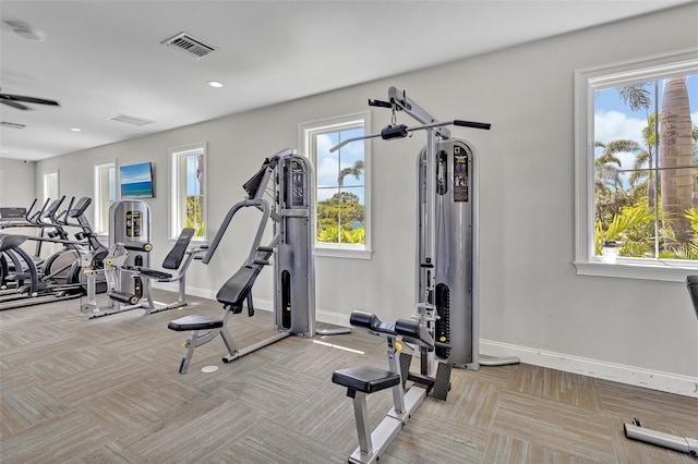workout area with visible vents and a wealth of natural light