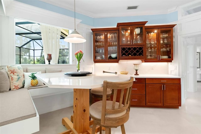 2196 Muskogee Trl, Nokomis, FL 34275 - indoor bar featuring hanging light fixtures and ornamental molding