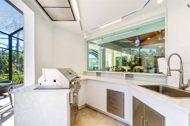 2196 Muskogee Trl, Nokomis, FL 34275 - washroom featuring a sink, light tile patterned floors, and a ceiling fan