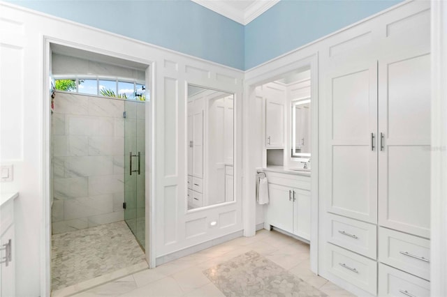2196 Muskogee Trl, Nokomis, FL 34275 - full bath featuring ornamental molding, a stall shower, vanity, and marble finish floors
