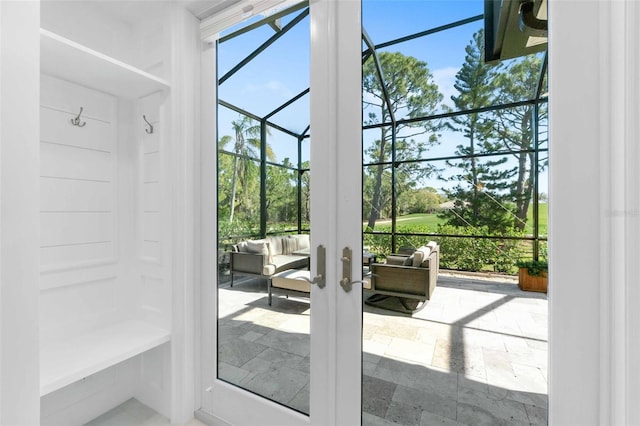 2196 Muskogee Trl, Nokomis, FL 34275 - doorway to outside featuring french doors and stone tile floors