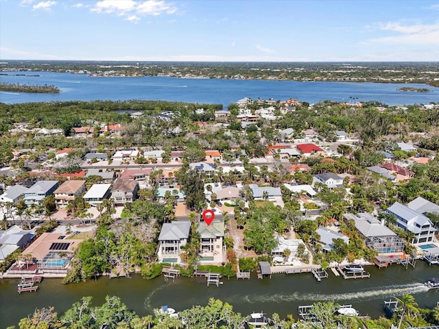 aerial view with a residential view and a water view