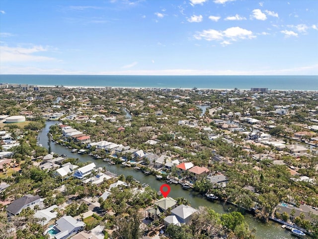 aerial view featuring a water view and a residential view