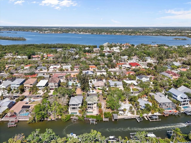 aerial view with a water view and a residential view