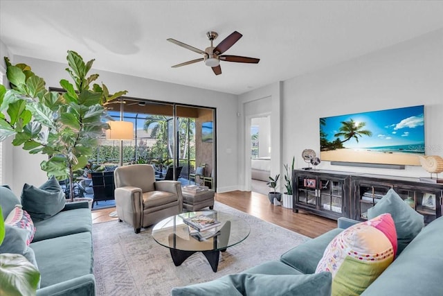 4704 Stafford Ct, Palmetto, FL 34221 - living area featuring ceiling fan, wood finished floors, and baseboards