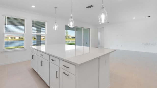 1599 Laurel Brook Ln, Port Charlotte, FL 33953 - kitchen with a center island, white cabinetry, light countertops, hanging light fixtures, and recessed lighting