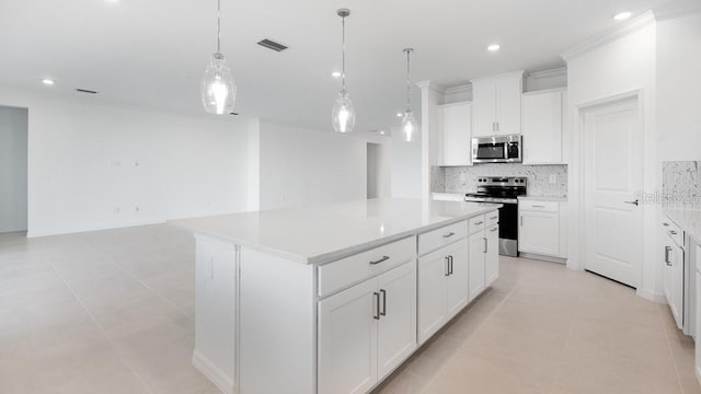 1599 Laurel Brook Ln, Port Charlotte, FL 33953 - kitchen featuring stainless steel appliances, decorative backsplash, light tile patterned floors, light countertops, and a center island
