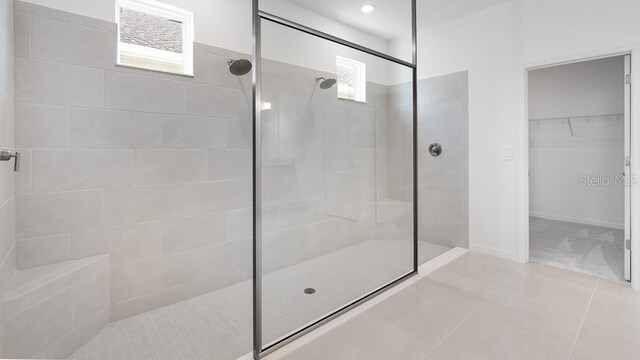 1599 Laurel Brook Ln, Port Charlotte, FL 33953 - full bathroom with walk in shower, tile patterned floors, and a spacious closet