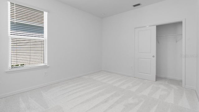 1599 Laurel Brook Ln, Port Charlotte, FL 33953 - unfurnished bedroom with carpet flooring, a closet, and baseboards