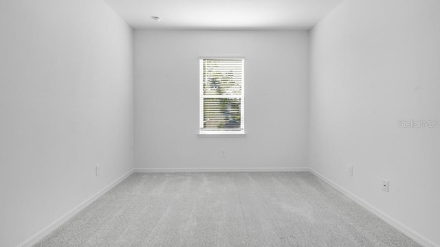 1599 Laurel Brook Ln, Port Charlotte, FL 33953 - empty room featuring light colored carpet and baseboards