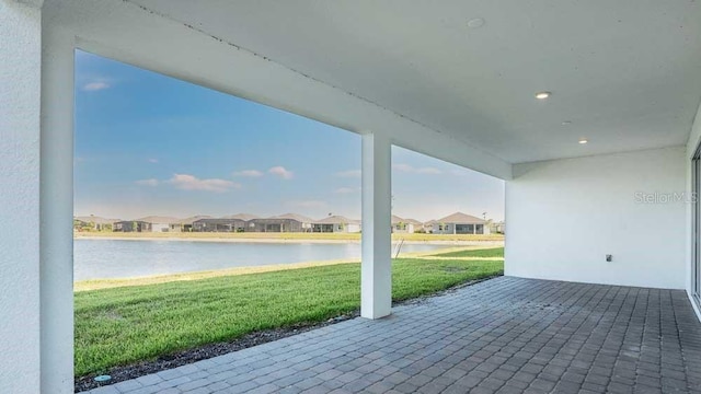 1599 Laurel Brook Ln, Port Charlotte, FL 33953 - view of patio featuring a water view and a residential view