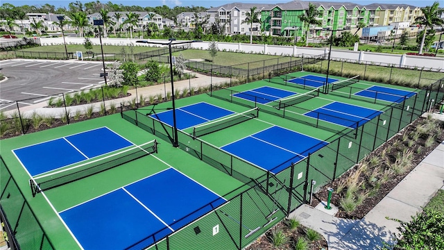 1599 Laurel Brook Ln, Port Charlotte, FL 33953 - view of tennis court with community basketball court and a residential view