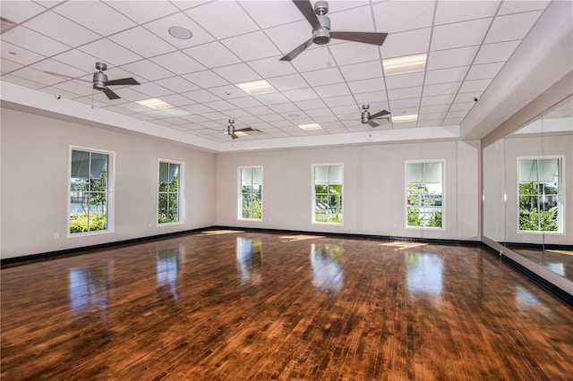 1599 Laurel Brook Ln, Port Charlotte, FL 33953 - spare room with ceiling fan, wood finished floors, baseboards, and a paneled ceiling