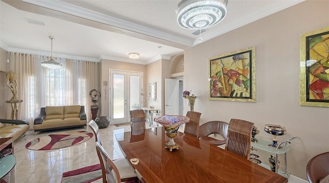 1085 Mallard Marsh Dr, Osprey, FL 34229 - dining space with marble finish floor, crown molding, and french doors