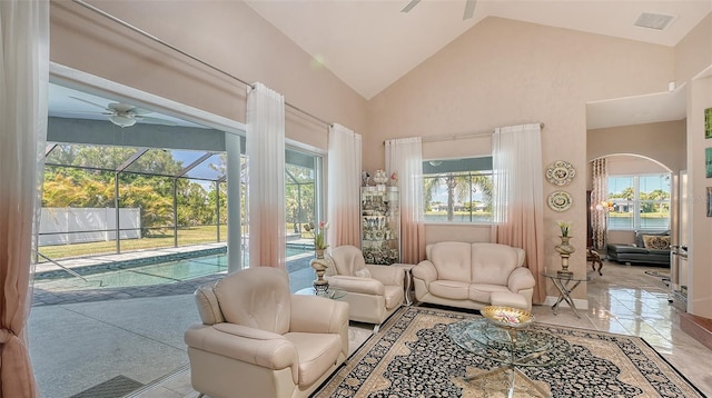 1085 Mallard Marsh Dr, Osprey, FL 34229 - interior space with arched walkways, plenty of natural light, a ceiling fan, and an outdoor hangout area