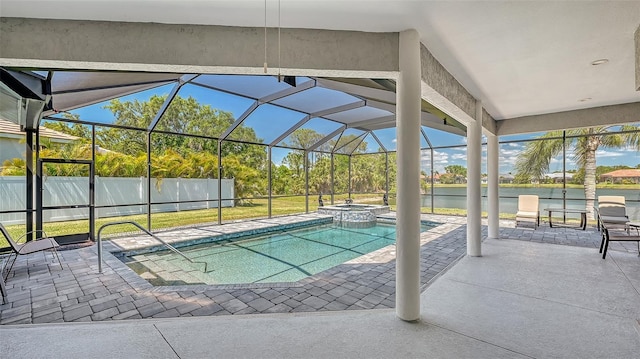 1085 Mallard Marsh Dr, Osprey, FL 34229 - view of swimming pool featuring fence, glass enclosure, a water view, a patio, and a pool with connected hot tub