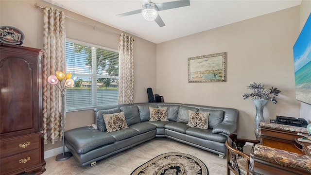 1085 Mallard Marsh Dr, Osprey, FL 34229 - living area with baseboards, ceiling fan, and light tile patterned floors