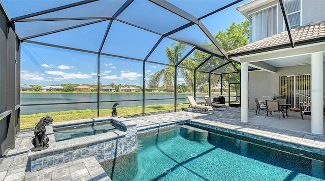1085 Mallard Marsh Dr, Osprey, FL 34229 - view of swimming pool featuring a lanai, a pool with connected hot tub, a water view, and a patio