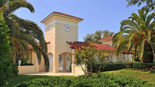 1085 Mallard Marsh Dr, Osprey, FL 34229 - back of property with a tile roof and stucco siding