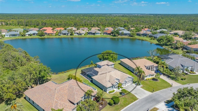 1085 Mallard Marsh Dr, Osprey, FL 34229 - bird's eye view with a residential view, a wooded view, and a water view
