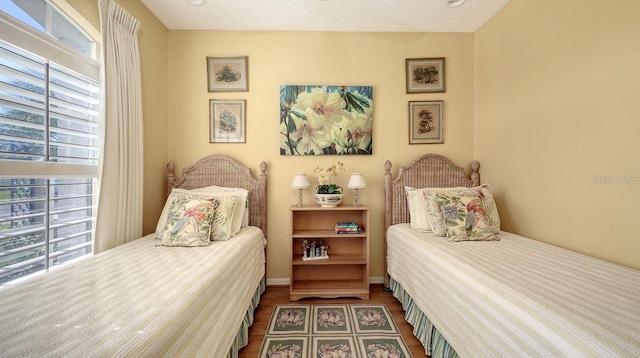 5022 46th St W, Bradenton, FL 34210 - bedroom with dark wood-style floors and multiple windows