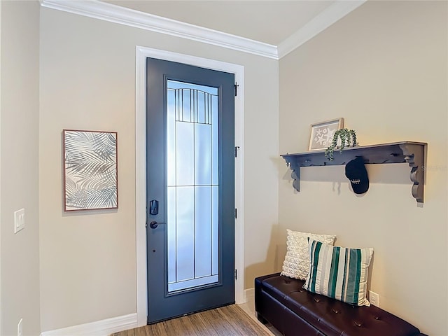 13724 Quinta St, Venice, FL 34293 - doorway to outside featuring crown molding, baseboards, and wood finished floors
