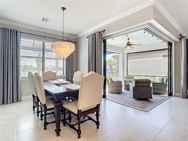 13724 Quinta St, Venice, FL 34293 - dining room with a wealth of natural light, visible vents, tile patterned flooring, and ornamental molding