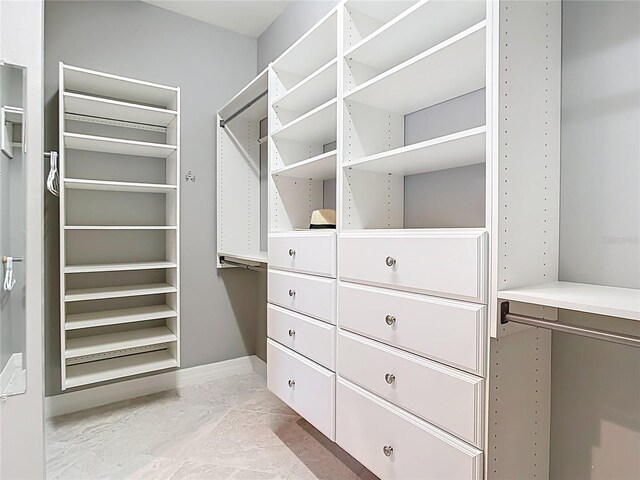 13724 Quinta St, Venice, FL 34293 - spacious closet featuring marble finish floor