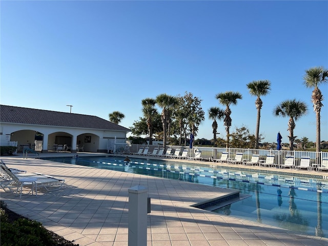 13724 Quinta St, Venice, FL 34293 - community pool featuring a patio and fence