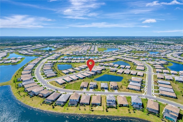 15719 Barefoot Beach Dr, Lakewood Ranch, FL 34211 - aerial perspective of suburban area with a large body of water