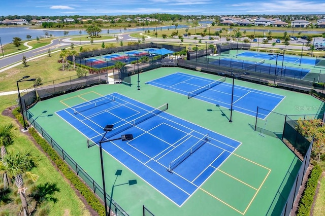 15719 Barefoot Beach Dr, Lakewood Ranch, FL 34211 - view of tennis court with a water view