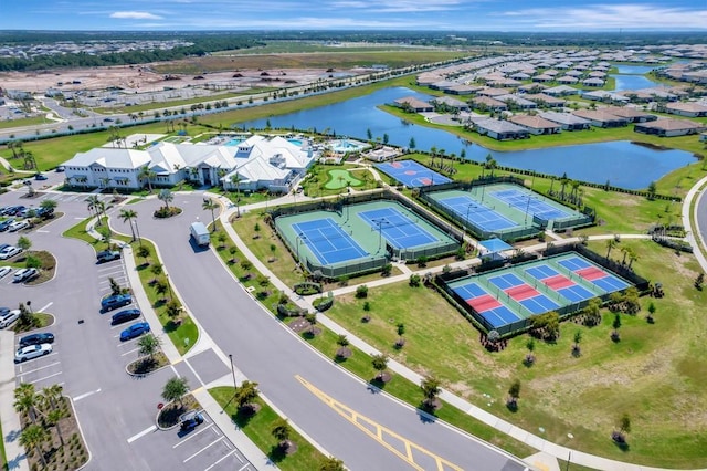 15719 Barefoot Beach Dr, Lakewood Ranch, FL 34211 - aerial perspective of suburban area with a nearby body of water