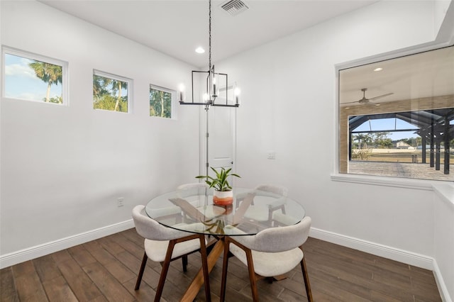 4712 Margutta Ct, Sarasota, FL 34240 - dining room with wood finished floors, baseboards, healthy amount of natural light, recessed lighting, and a chandelier