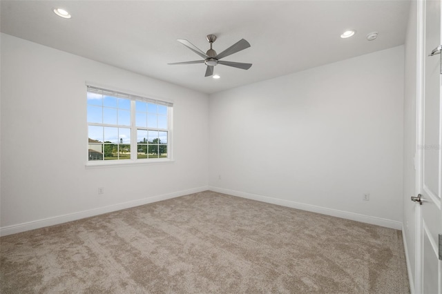 4712 Margutta Ct, Sarasota, FL 34240 - carpeted empty room with a ceiling fan, recessed lighting, and baseboards