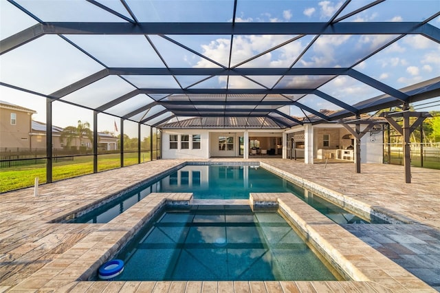 4712 Margutta Ct, Sarasota, FL 34240 - view of pool with a patio, a pool with connected hot tub, and glass enclosure