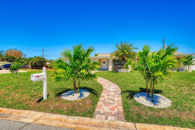 2605 Sunnybrook Dr, Sarasota, FL 34239 - obstructed view of property with a front lawn