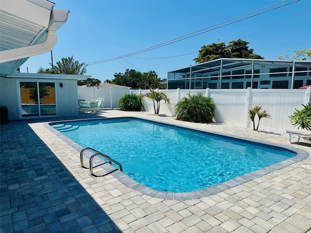 2605 Sunnybrook Dr, Sarasota, FL 34239 - view of swimming pool featuring a fenced in pool, a fenced backyard, and a patio area