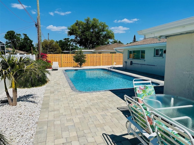 2605 Sunnybrook Dr, Sarasota, FL 34239 - view of swimming pool featuring a fenced in pool, a fenced backyard, and a patio area