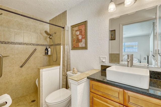 2605 Sunnybrook Dr, Sarasota, FL 34239 - full bathroom featuring vanity, a textured wall, toilet, a textured ceiling, and a tile shower