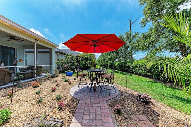 view of patio with a ceiling fan