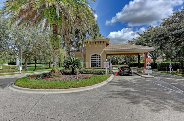 exterior space with an attached carport and driveway