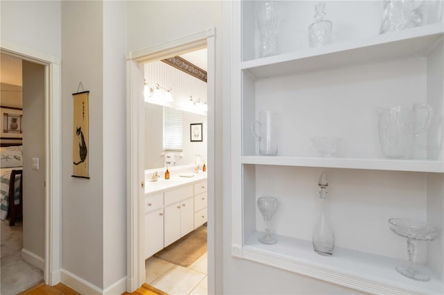 1860 Citron St, Punta Gorda, FL 33980 - bathroom featuring tile patterned floors and vanity