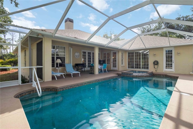 1860 Citron St, Punta Gorda, FL 33980 - view of pool featuring a patio area, french doors, a pool with connected hot tub, and glass enclosure